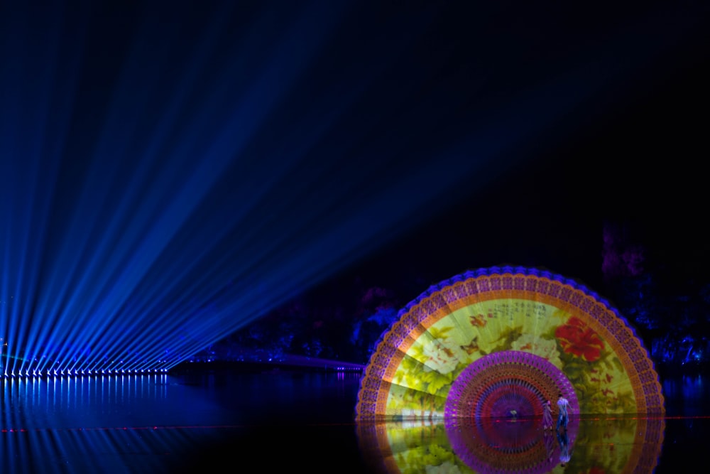 blue and pink lighted ferris wheel