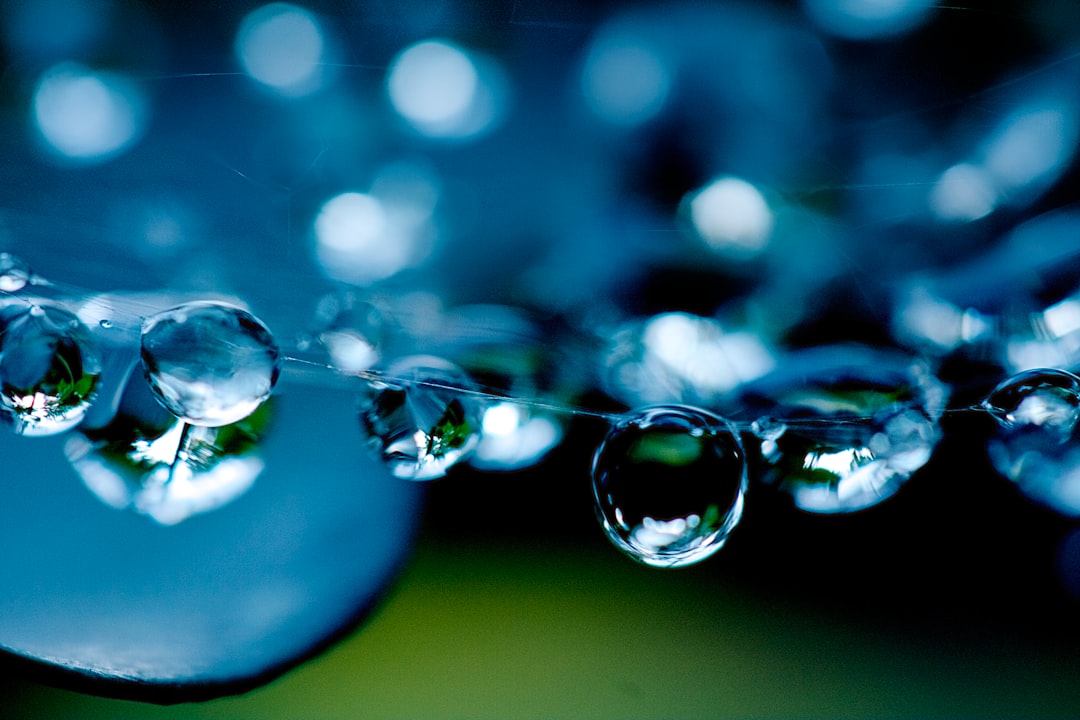 water droplets on glass in close up photography