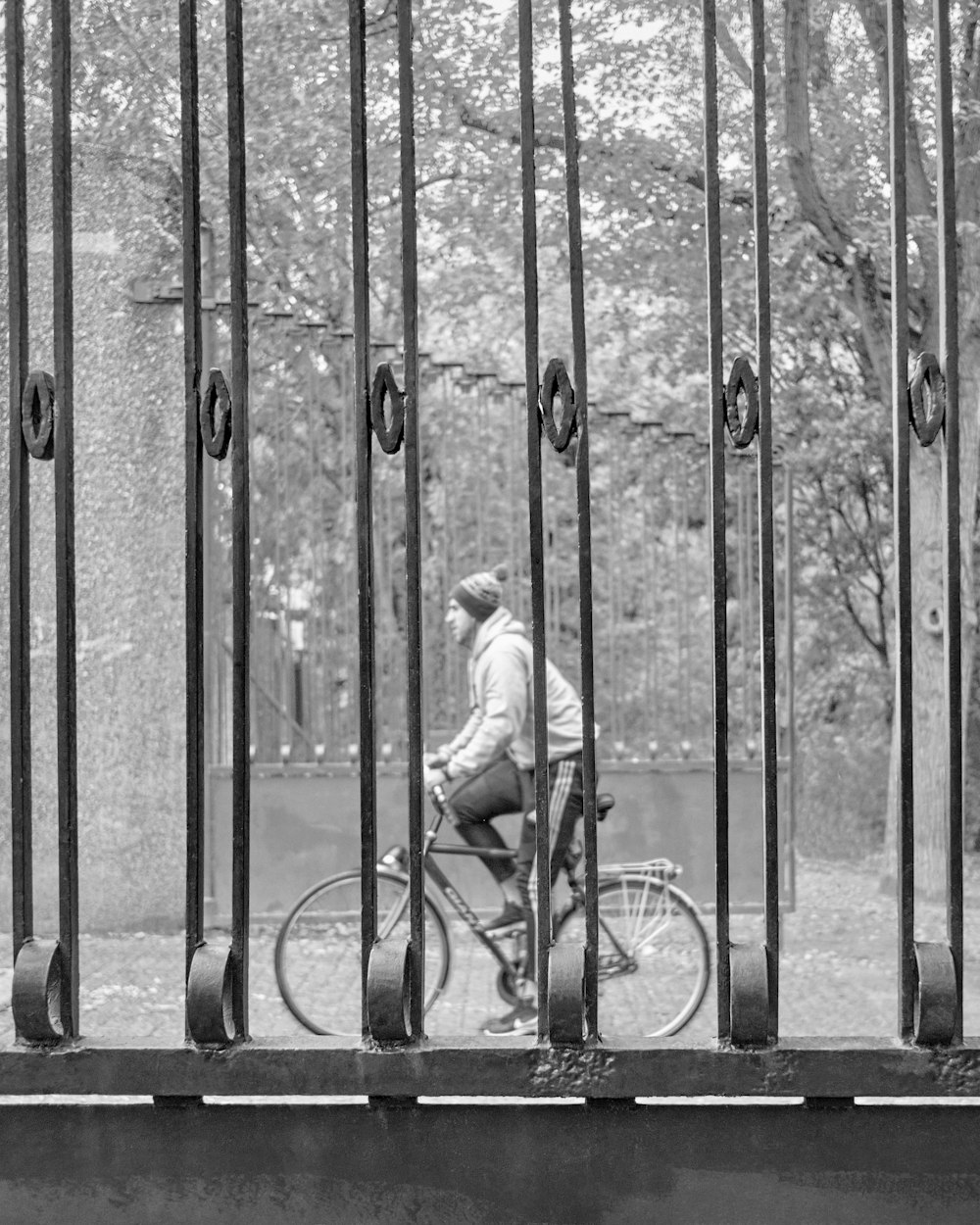 grayscale photo of girl riding bicycle