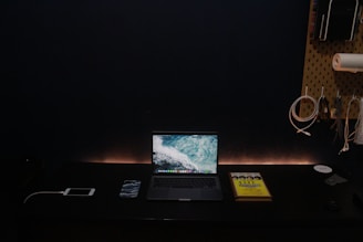 Calm workspace featuring warm sand tones and a minimalist setup with a tactile feedback device.