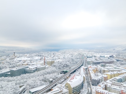 city buildings under white sky during daytime