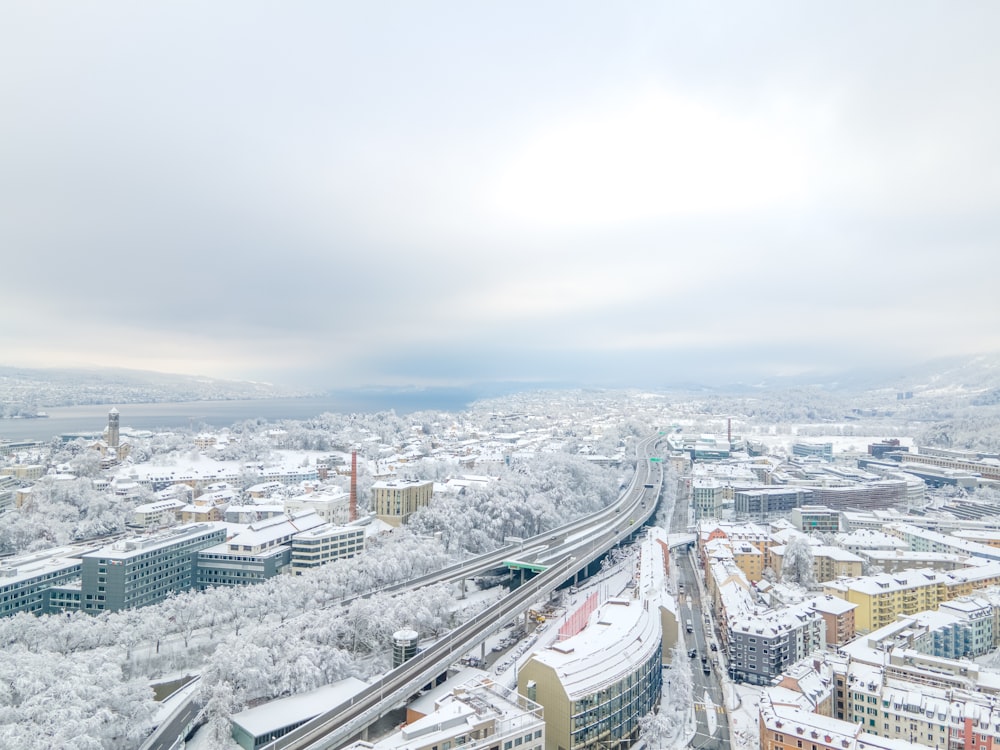 city buildings under white sky during daytime