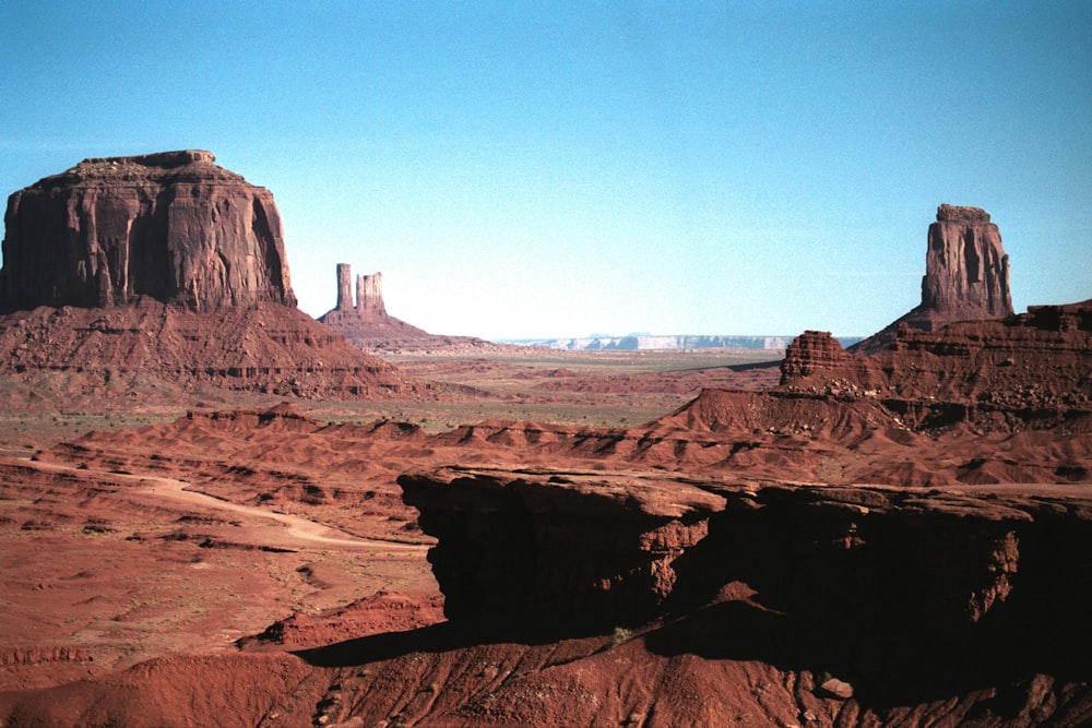 brown rock formation under blue sky during daytime