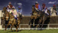 2 men riding horse during daytime