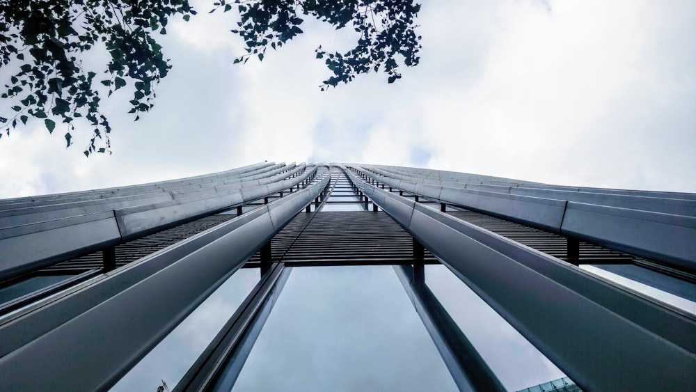 low angle photography of gray concrete building