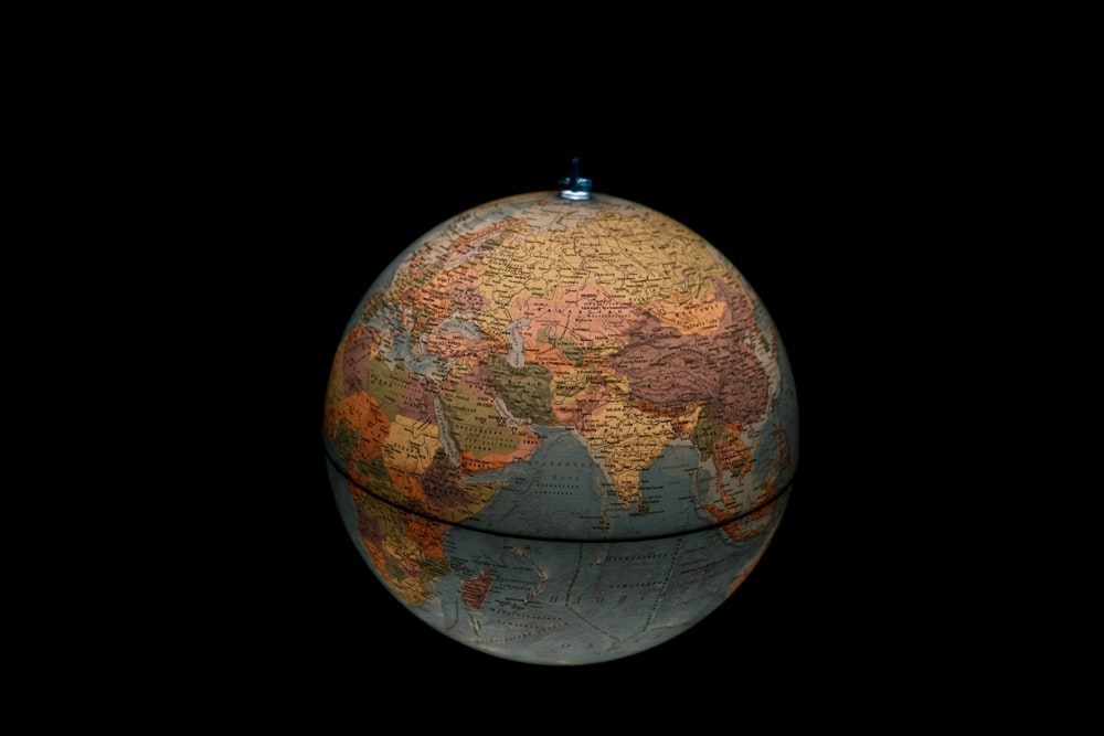 brown and blue desk globe