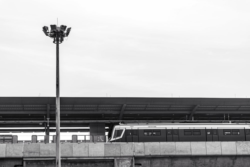 gray and black train on rail during daytime