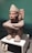 brown concrete statue of man