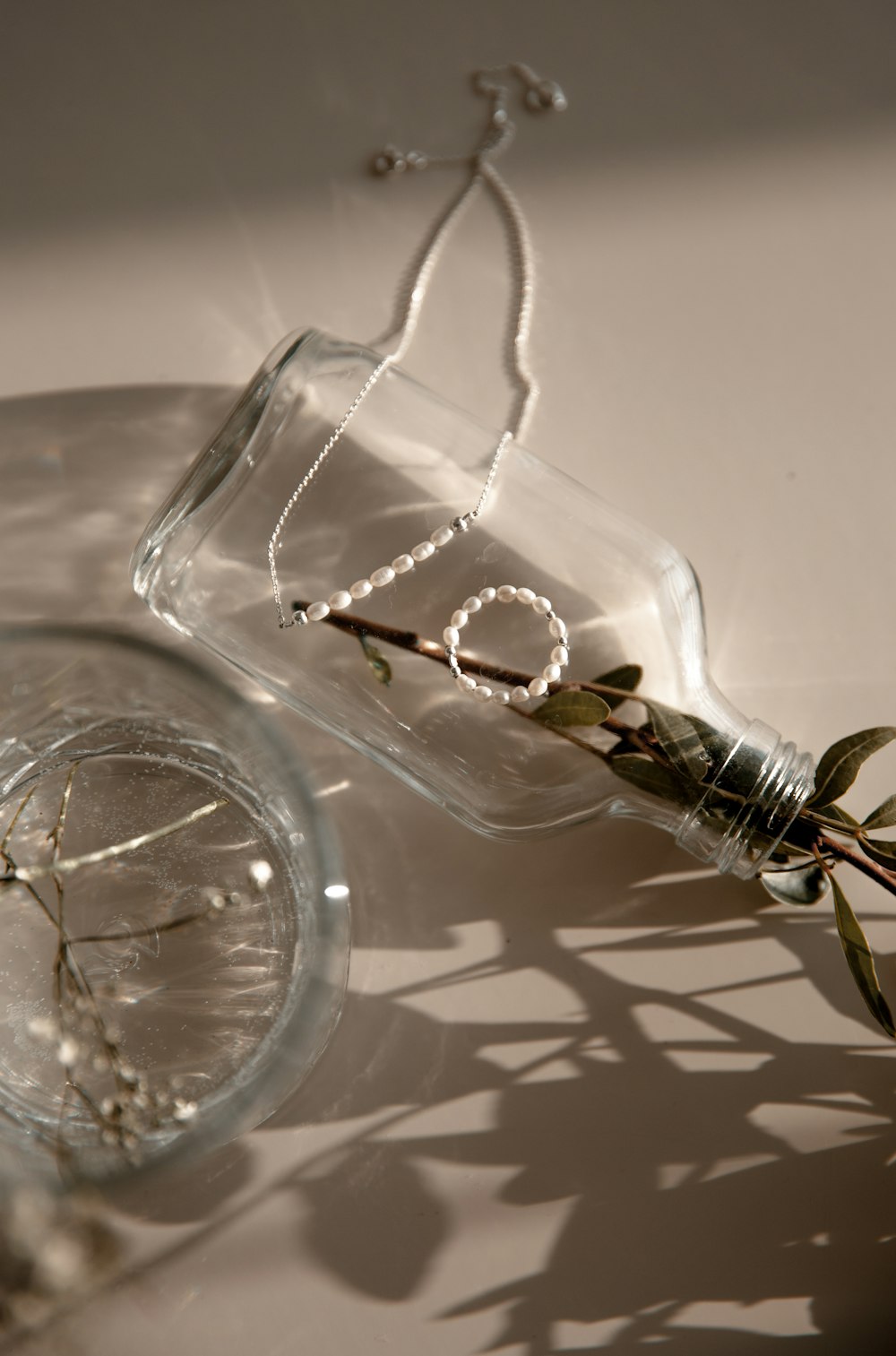 clear glass bottle with water