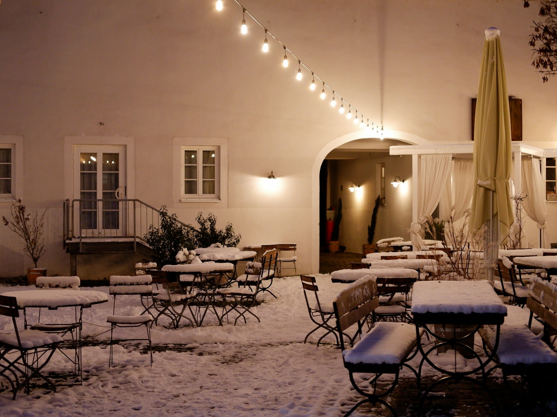 woman wearing yellow long-sleeved dress under white clouds and blue sky during daytime