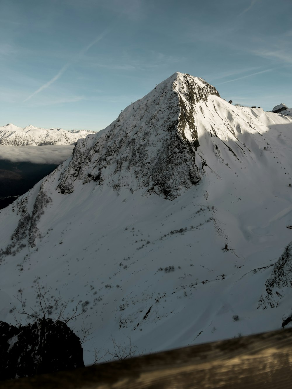 snow covered mountain during daytime