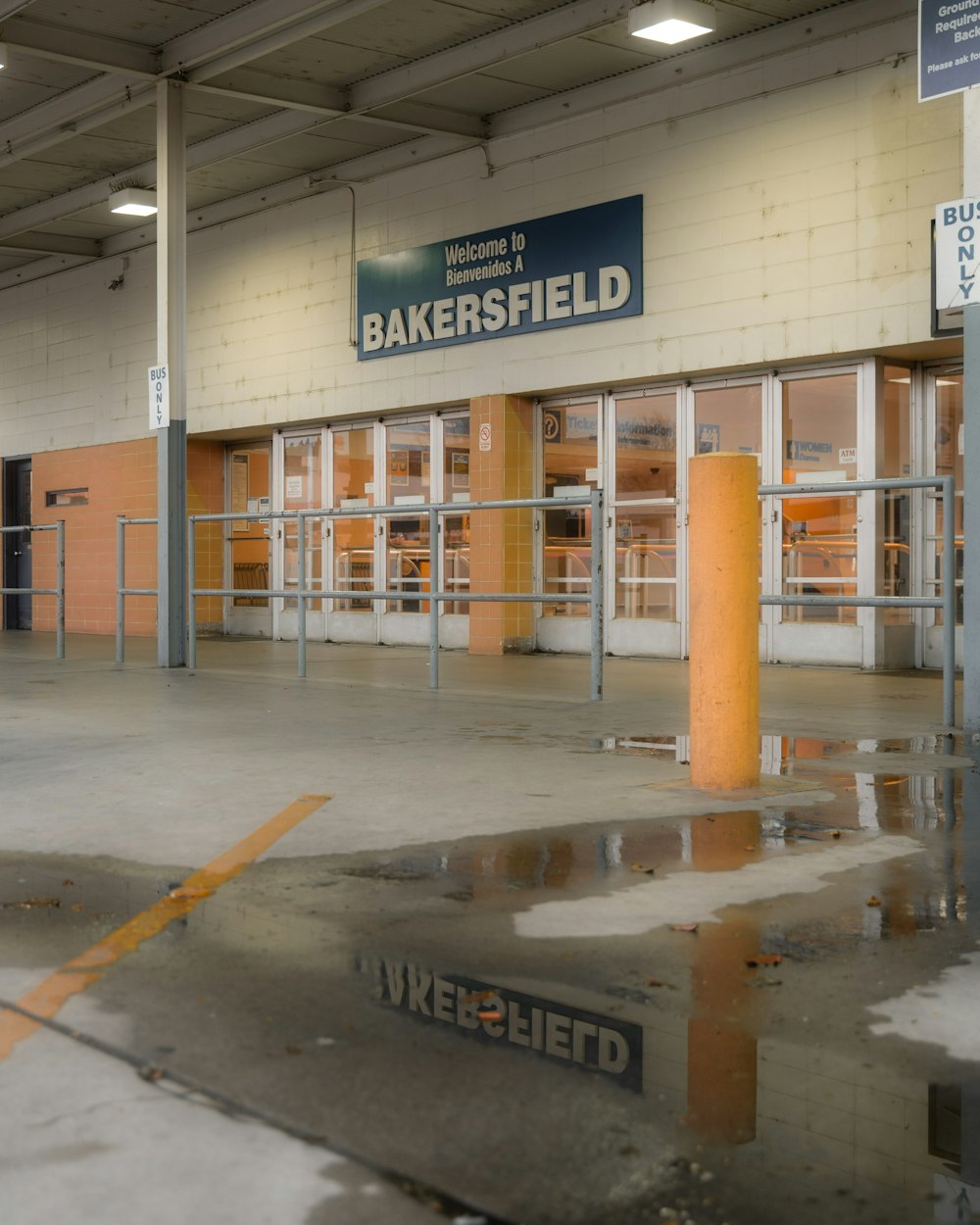 an empty building with a sign that says bakers field