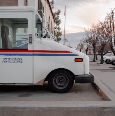 white van on the road during daytime