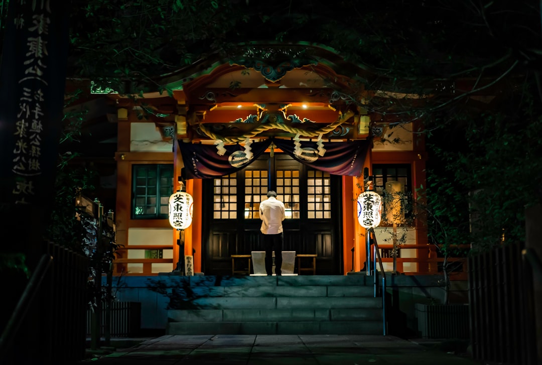 brown wooden house with lights turned on during nighttime