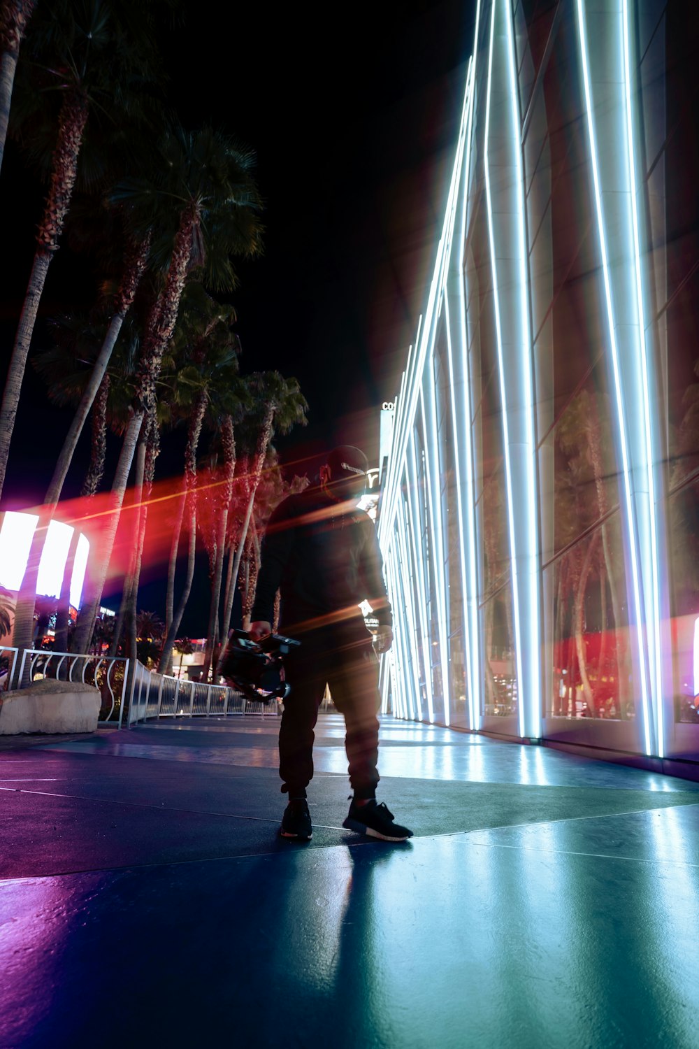 people walking on street during nighttime