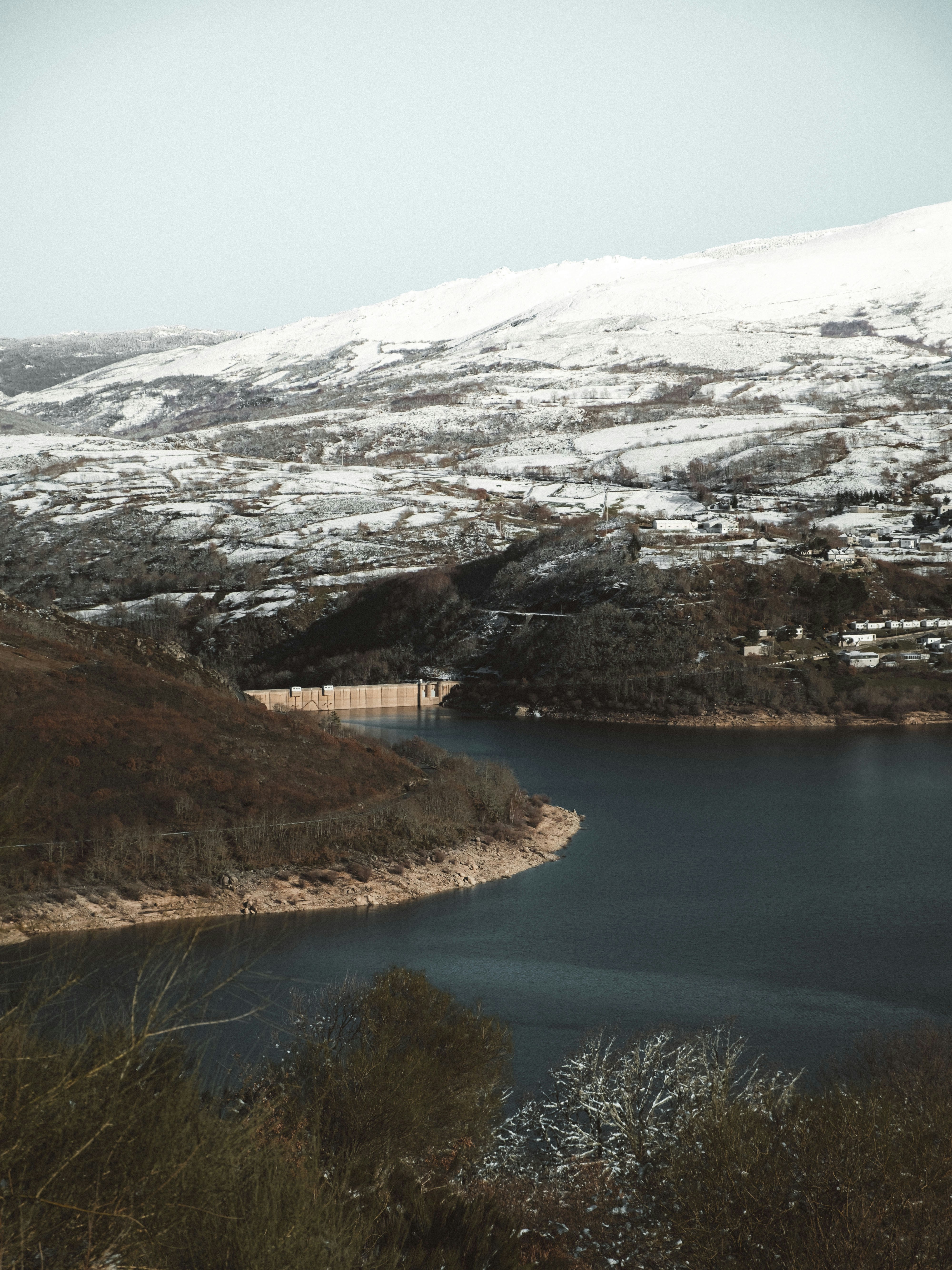 White and brown mountain near body of water during daytime photo – Free ...