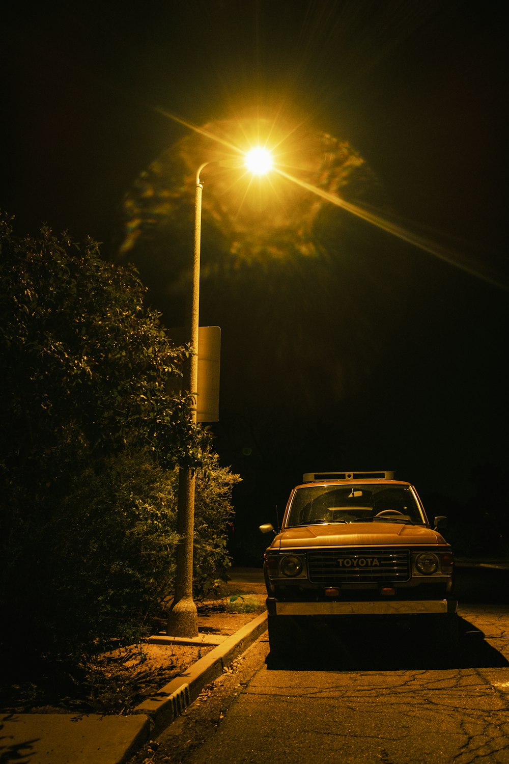 black car on road during daytime