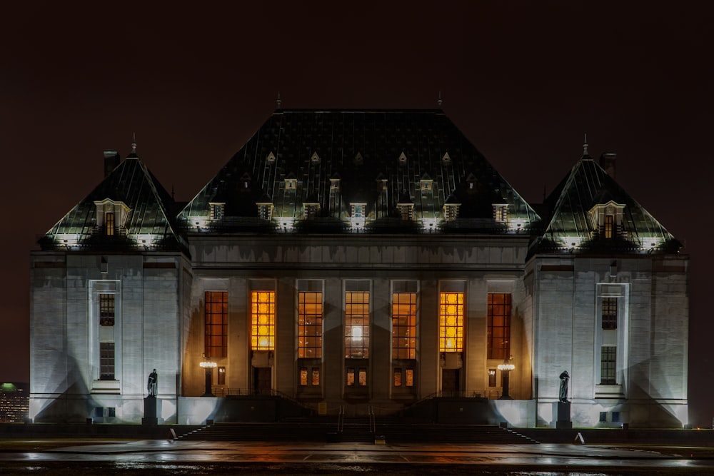 white and brown concrete building during night time