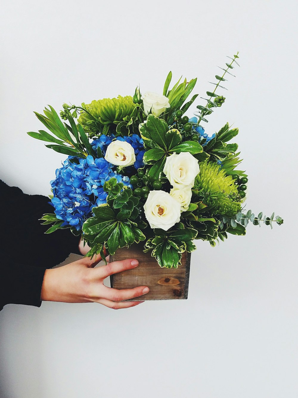 white and blue flower bouquet