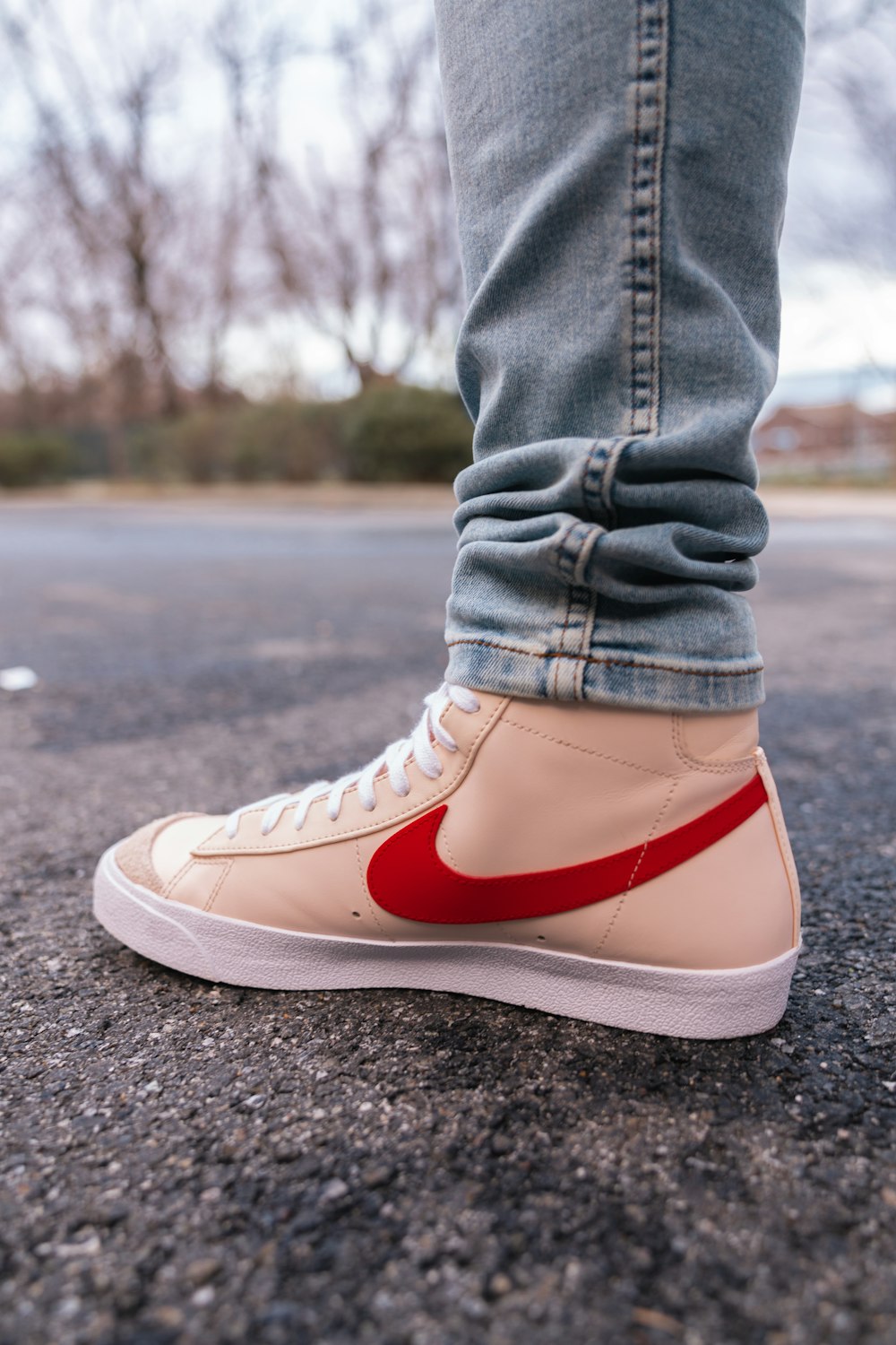 Person in blue denim jeans and brown and white nike sneakers photo – Free  Usa Image on Unsplash