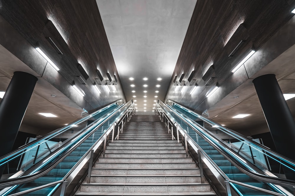 blue and white staircase in tunnel