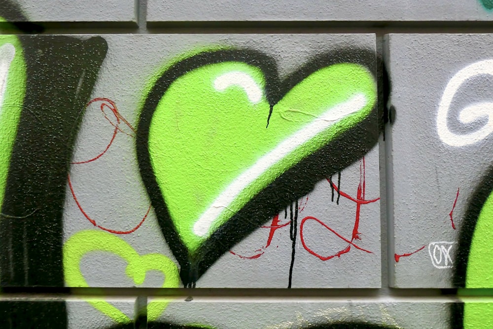green and black heart wall art