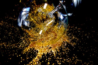 A vibrant digital illustration of a lightbulb surrounded by colorful sparks representing creative ideas.