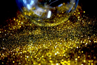 A glowing crystal orb resting on a velvet cloth.