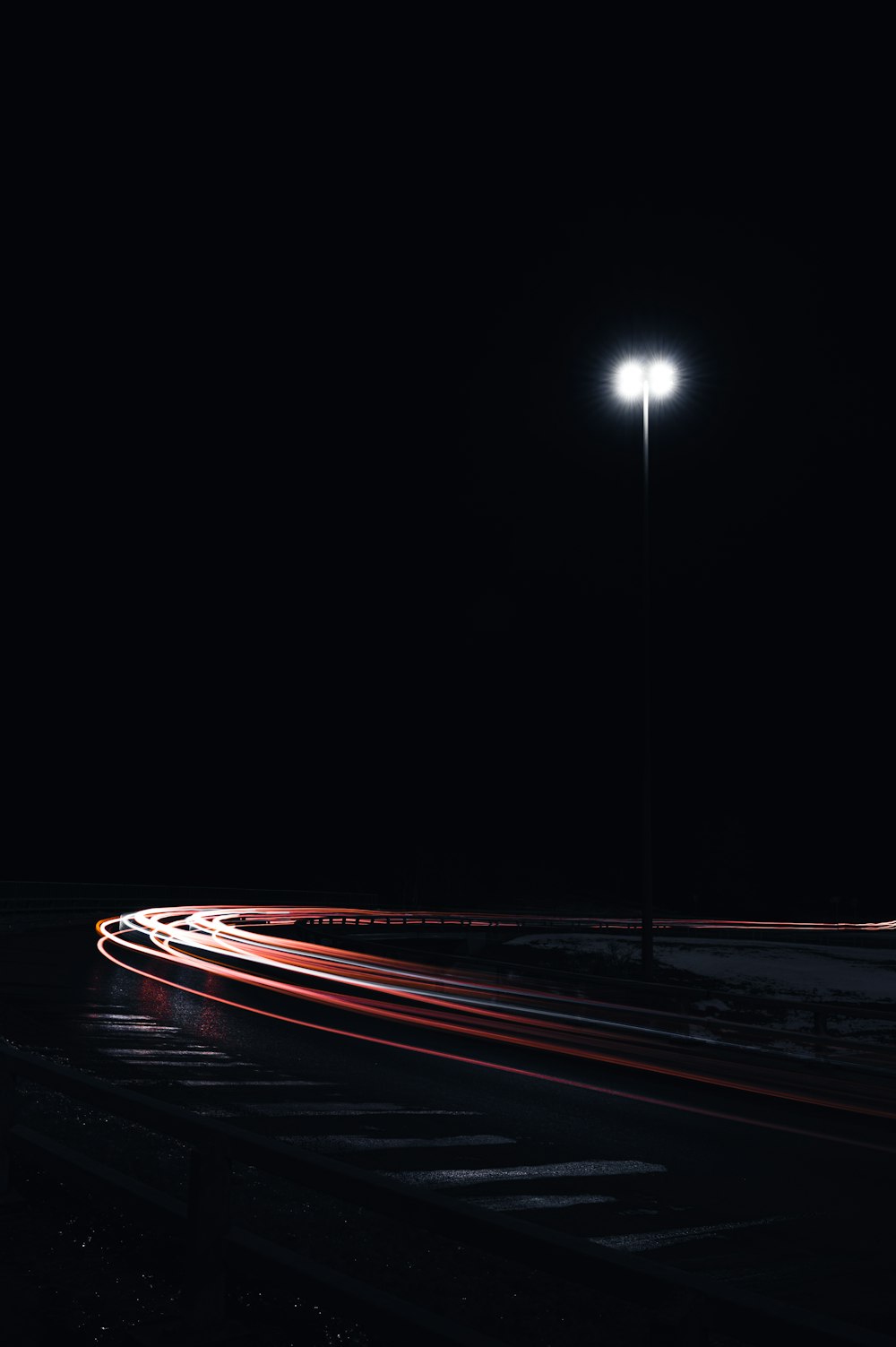 time lapse photography of cars on road during night time