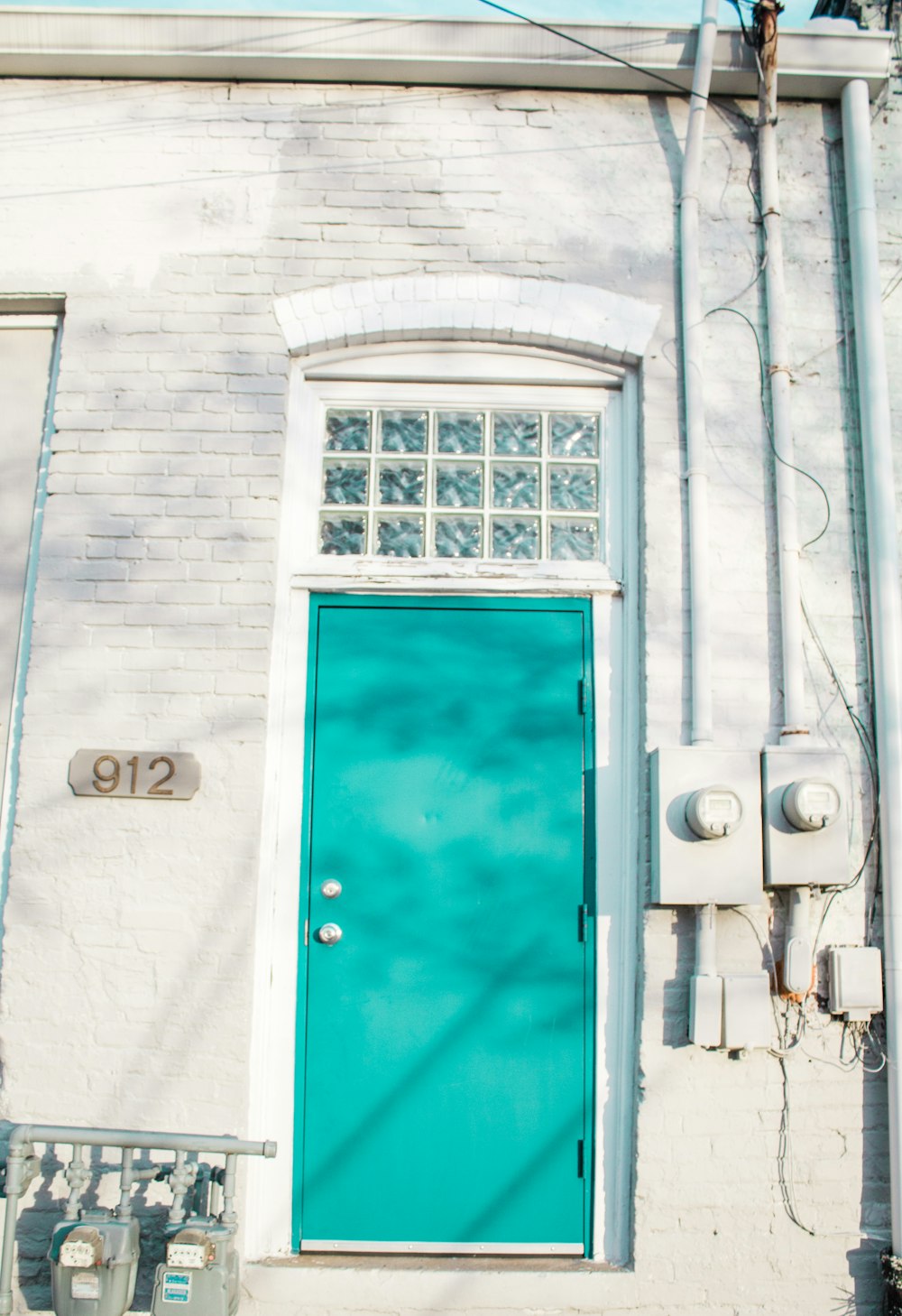 white wooden framed glass window