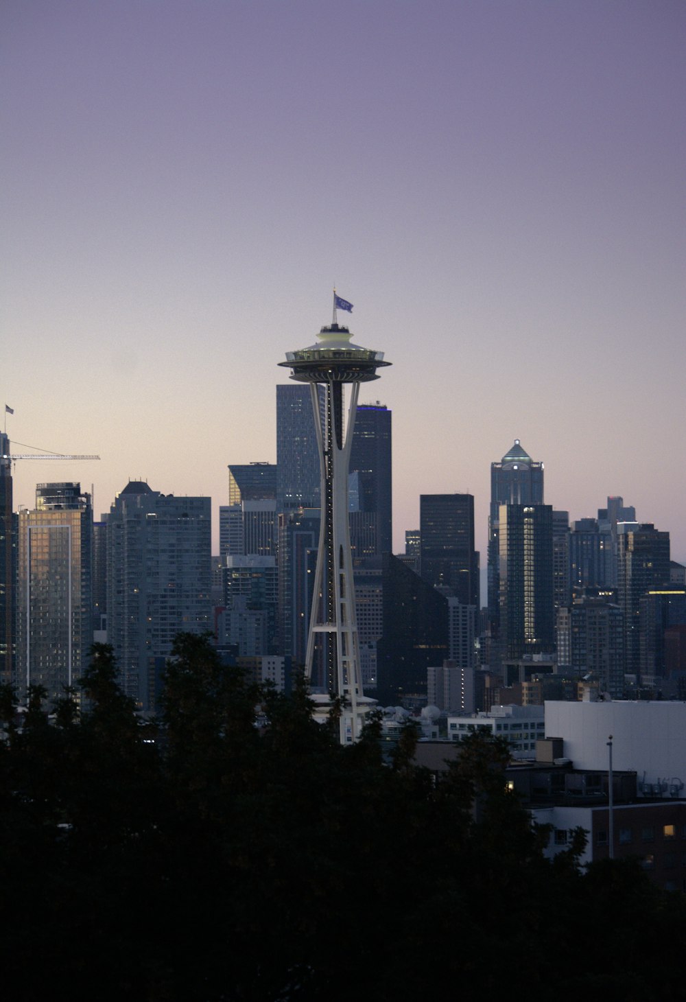 city skyline under gray sky during daytime