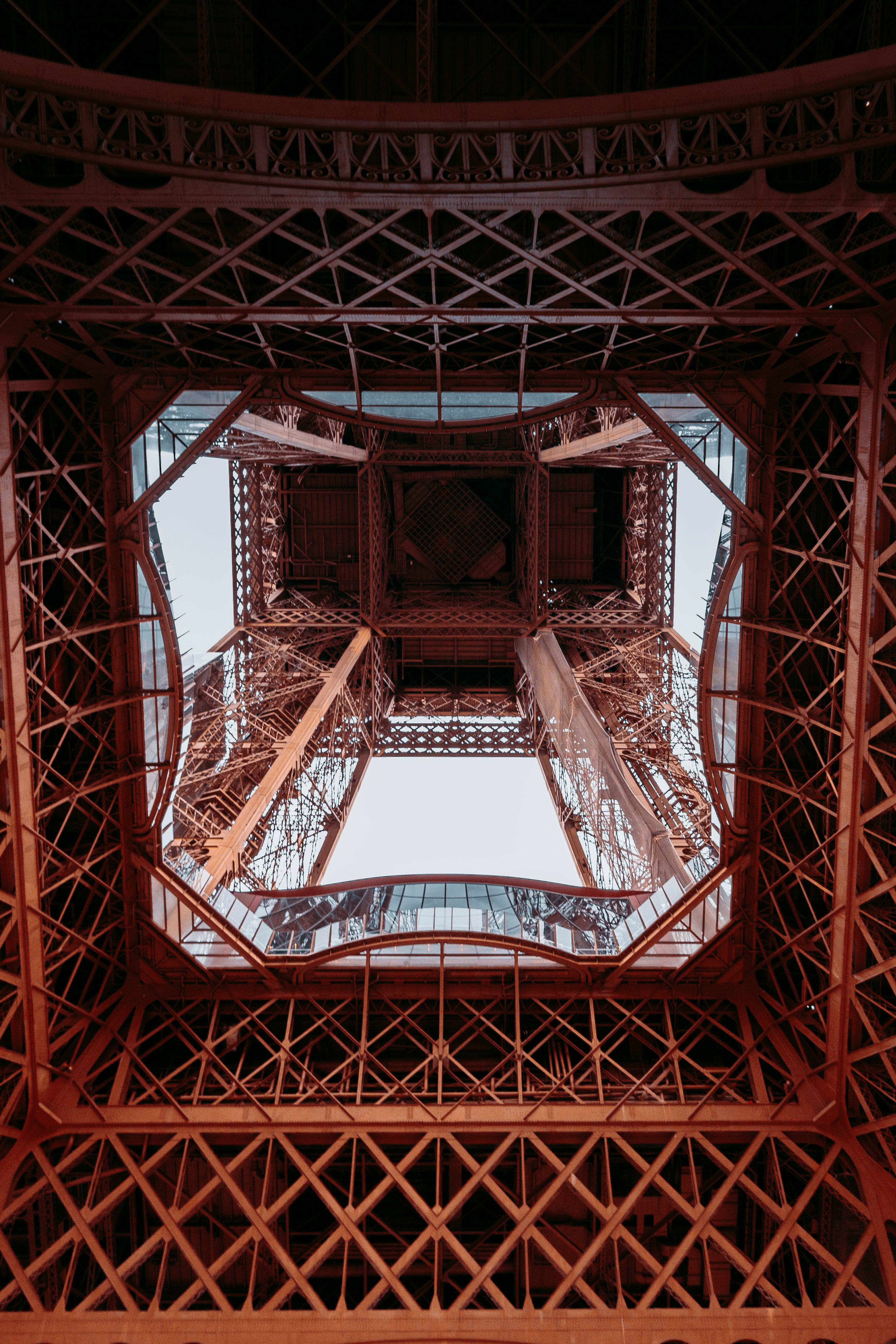 low angle photography of brown metal building