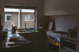 white electric kettle on black table