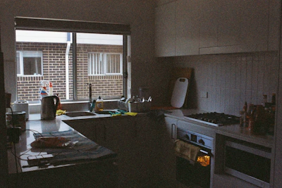 white electric kettle on black table