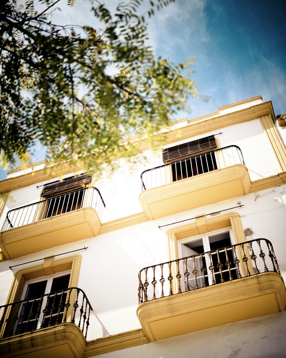 yellow concrete building during daytime