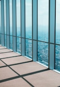 blue glass window during daytime