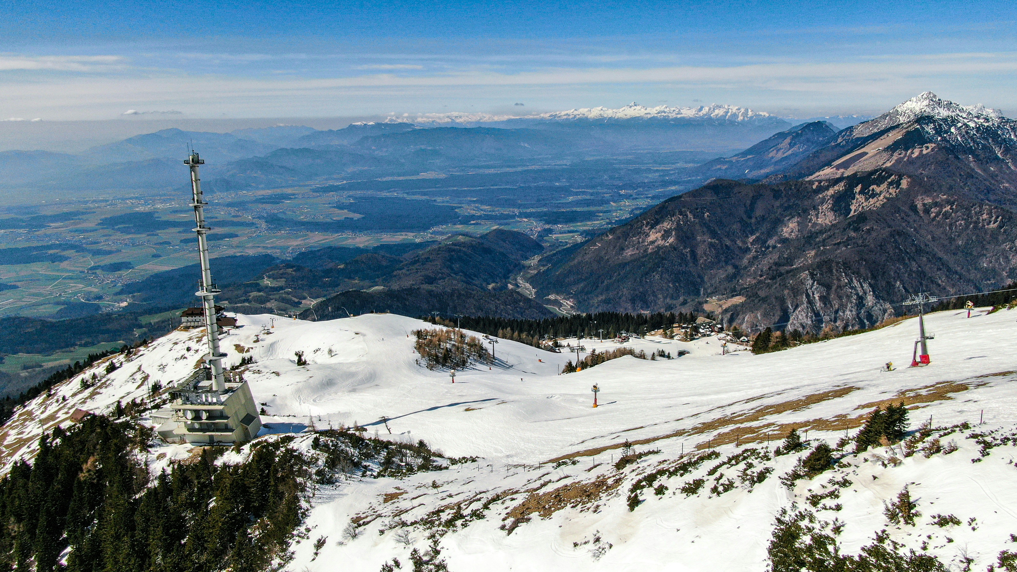Snow-capped mountain under a clear blue sky