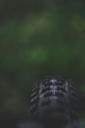 black leather shoe in close up photography