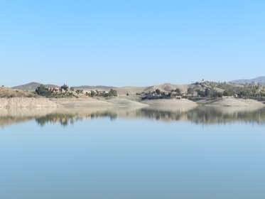 A serene landscape photograph capturing the harmony between nature and human creativity.