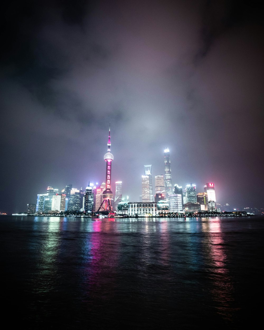 city skyline during night time