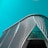 An architectural structure featuring a modern, curved design with a pattern of diagonal lines and large glass elements in the facade against a teal sky.