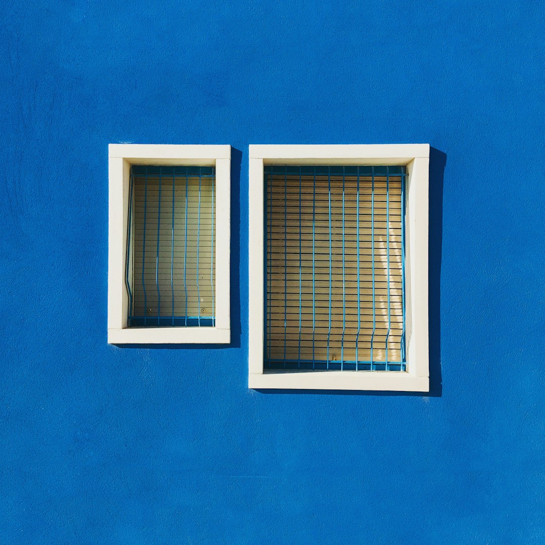 white wooden framed glass window