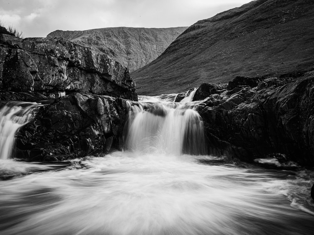 grayscale photo of water falls