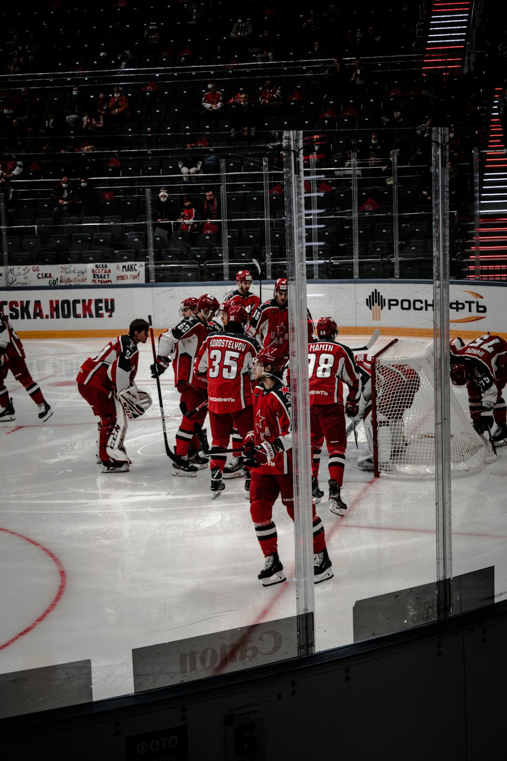 ice hockey players on ice hockey stadium