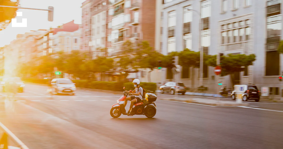 Street Riding Motorcycle Man riding motorcycle on road during daytime photo – Free City Image on ...