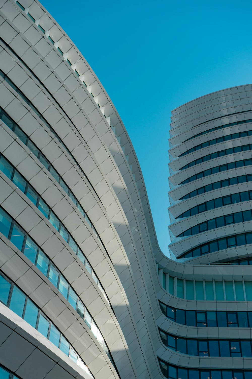 white concrete building under blue sky during daytime