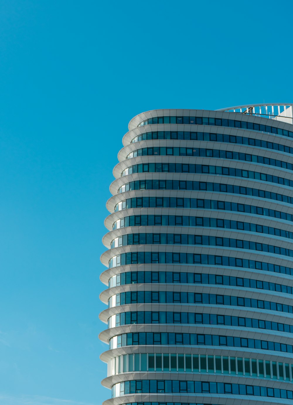 gray concrete building under blue sky during daytime