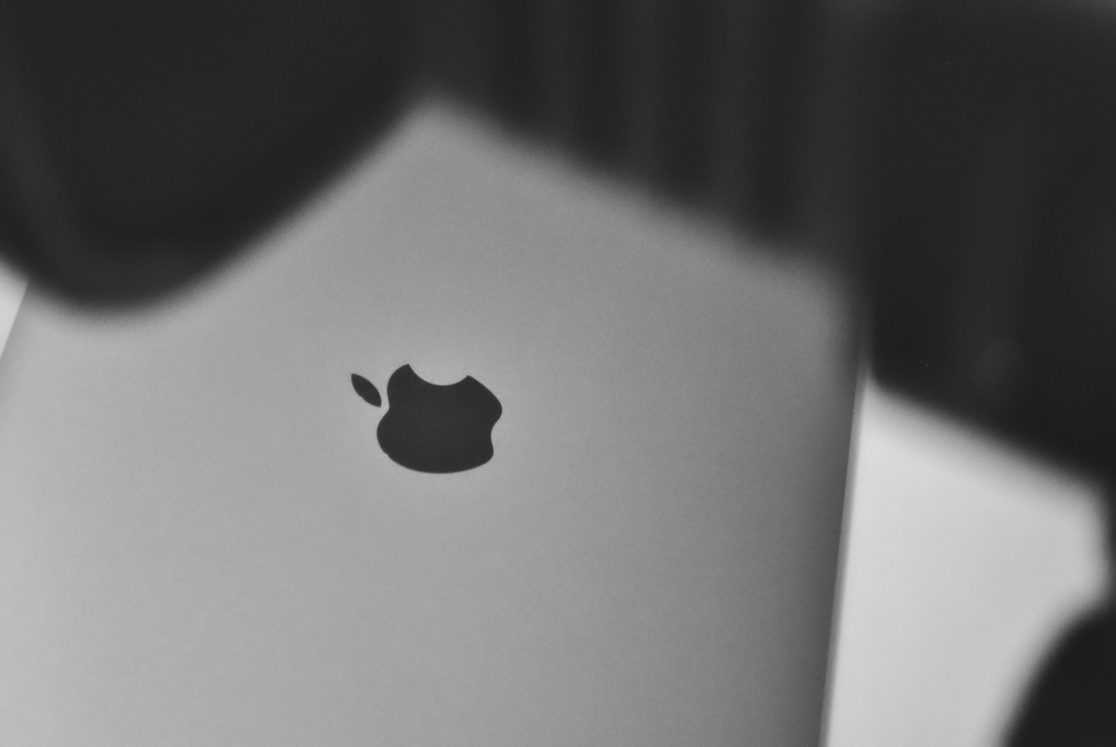 Apple logo representing brand reliability and premium quality in electronics