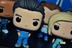 Close-up photo of fun, detailed pop culture vinyl figures with expressive faces