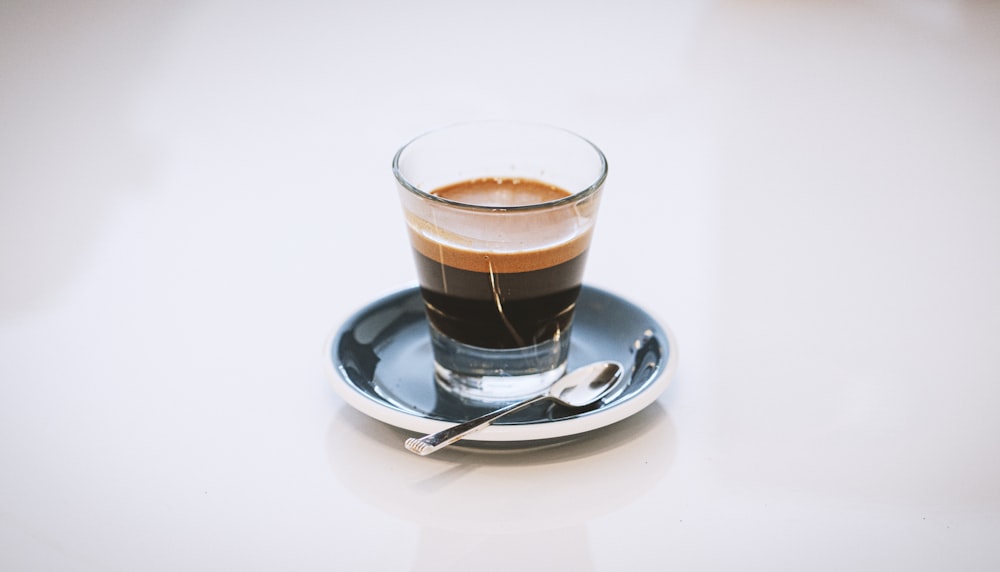 Premium Photo  Double shot espresso coffee in the glasses on vintage wood  table